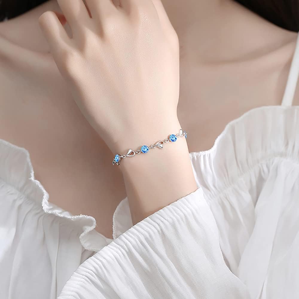 Kaguyo Bracelets en argent pour femmes - Bracelet en cristal ajustable en forme d'infini en argent 925, forme de cœur en zirconia bleu pour femmes et filles - Cadeau d'anniversaire d'amitié (bleu)