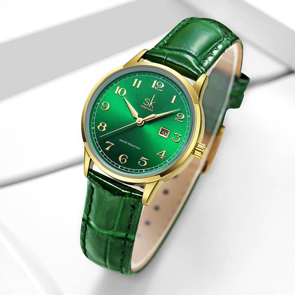 SHENGKE SK Classic Business Women Montres avec Bracelet en Acier Inoxydable et Montre élégante en Cuir véritable pour Dames (Gold-Green)